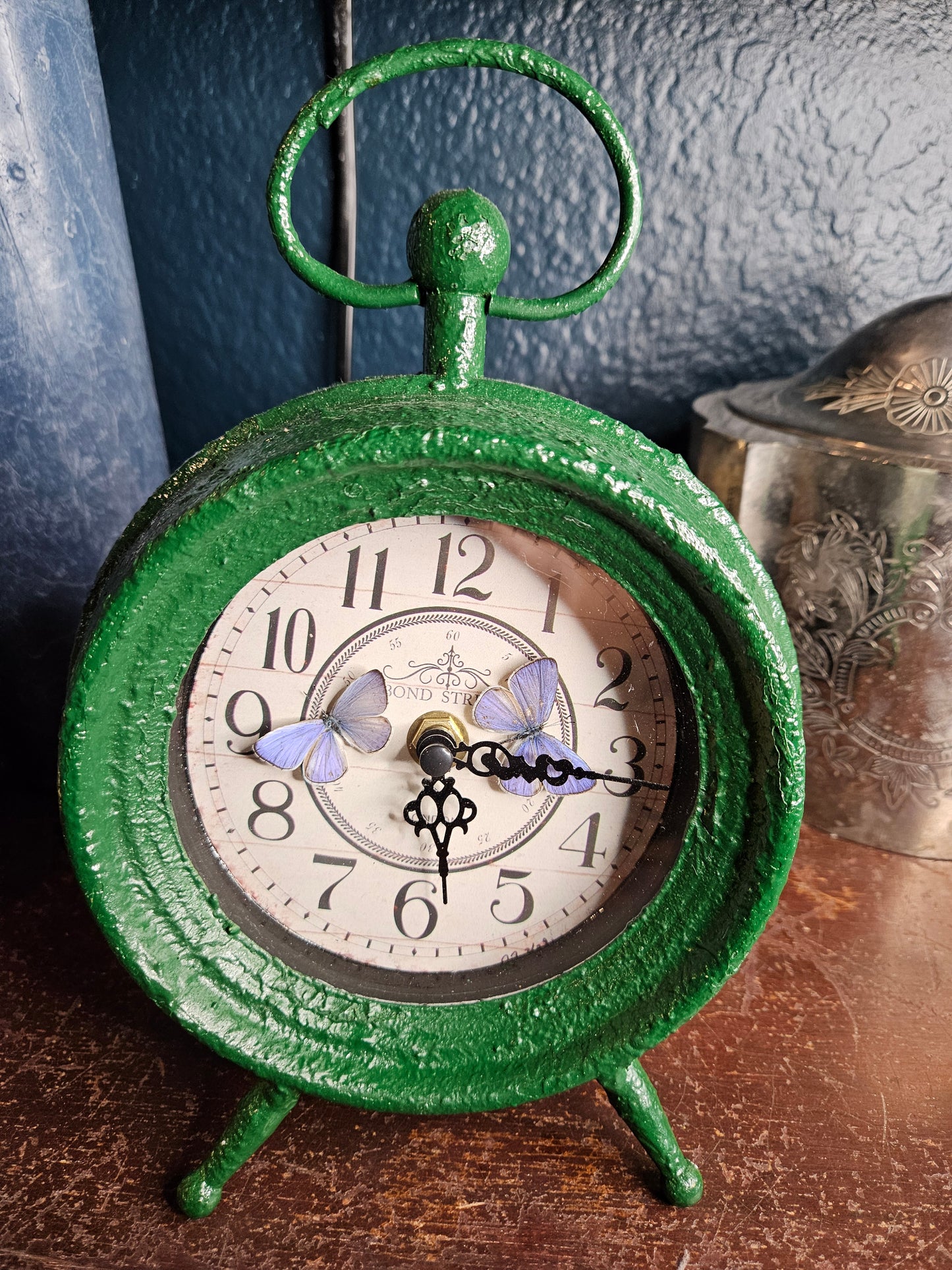Green clock double purple Holly blue butterflies