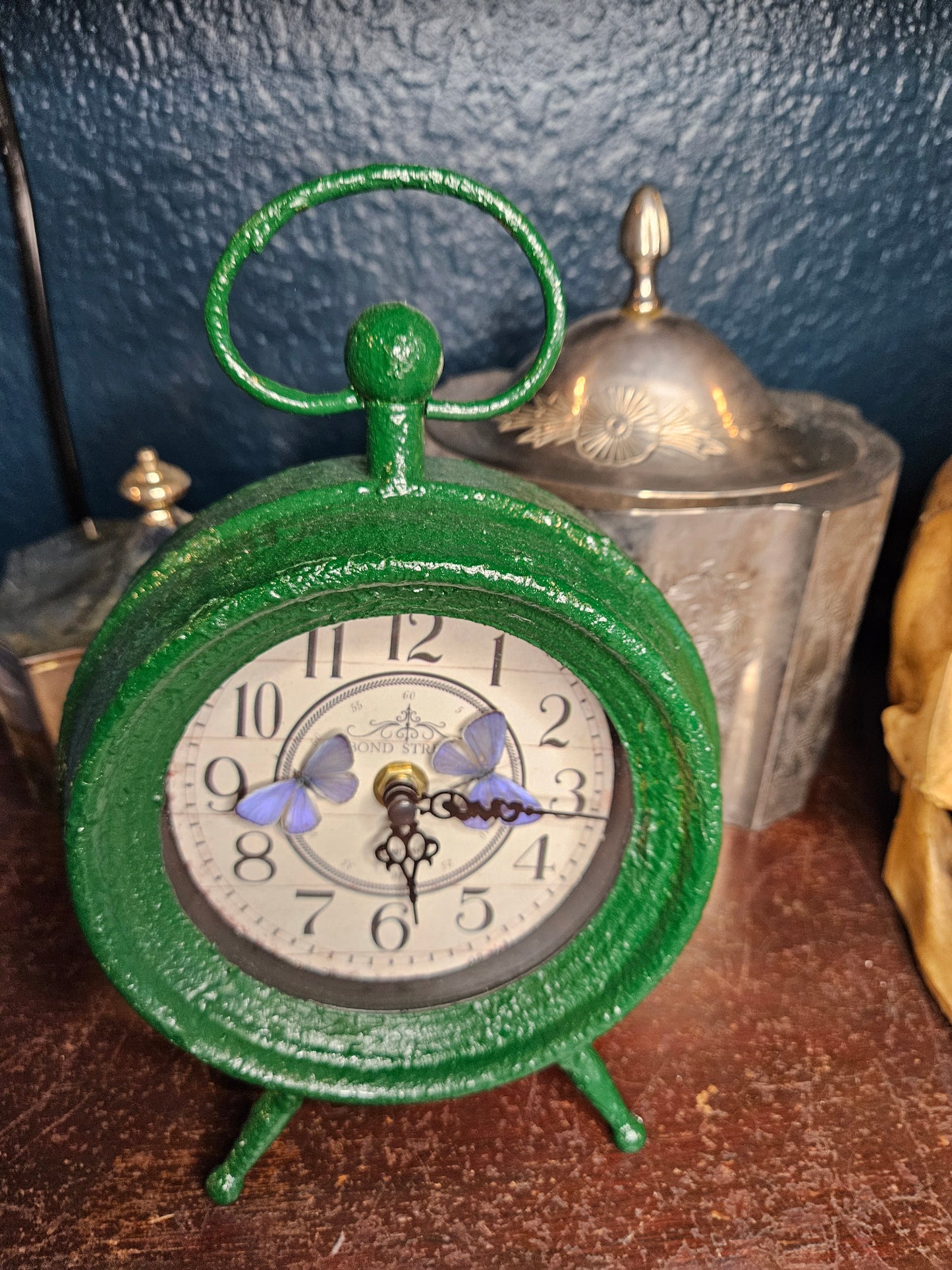 Green clock double purple Holly blue butterflies