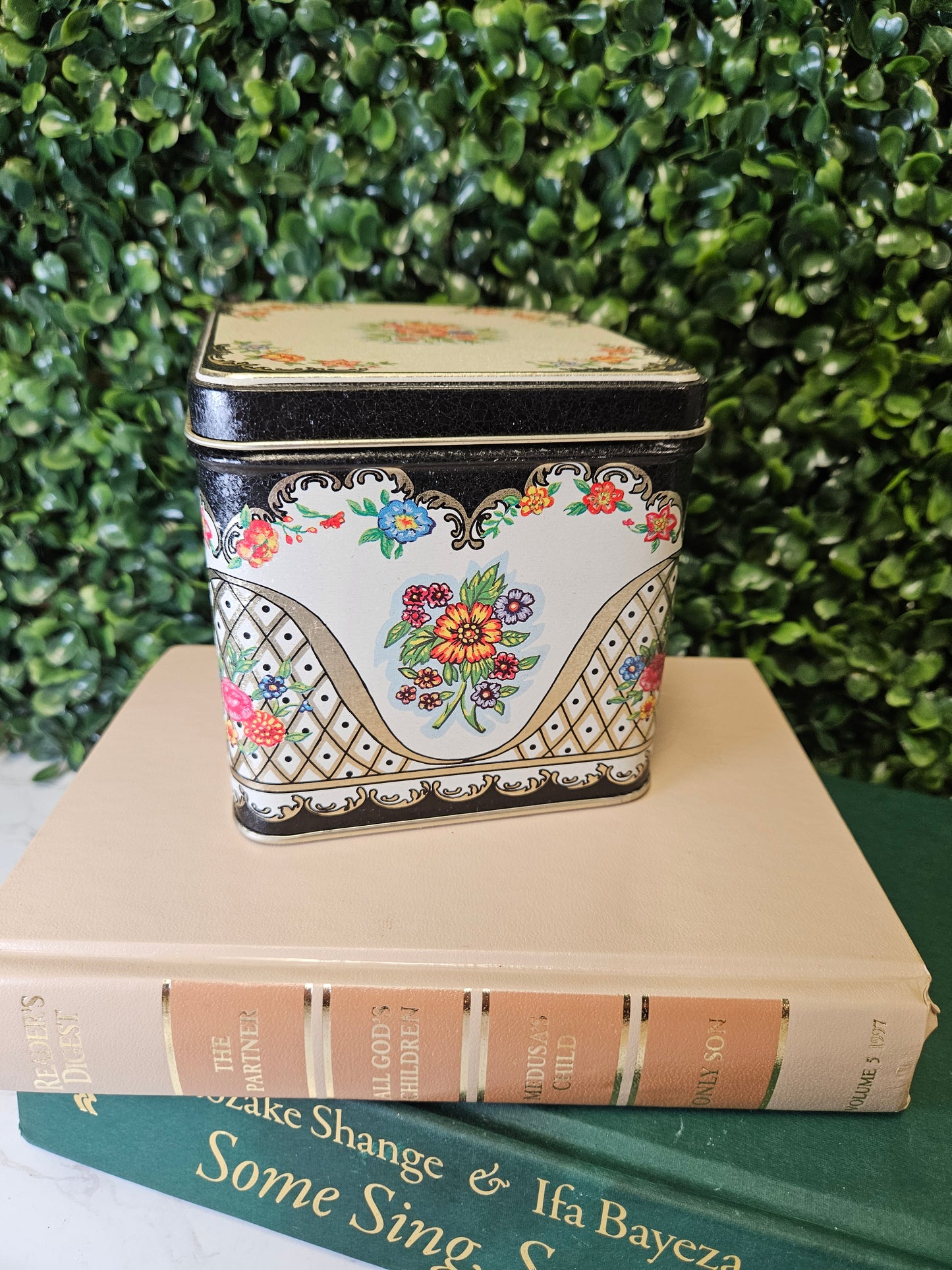 Vintage floral tin - black ,blue, orange