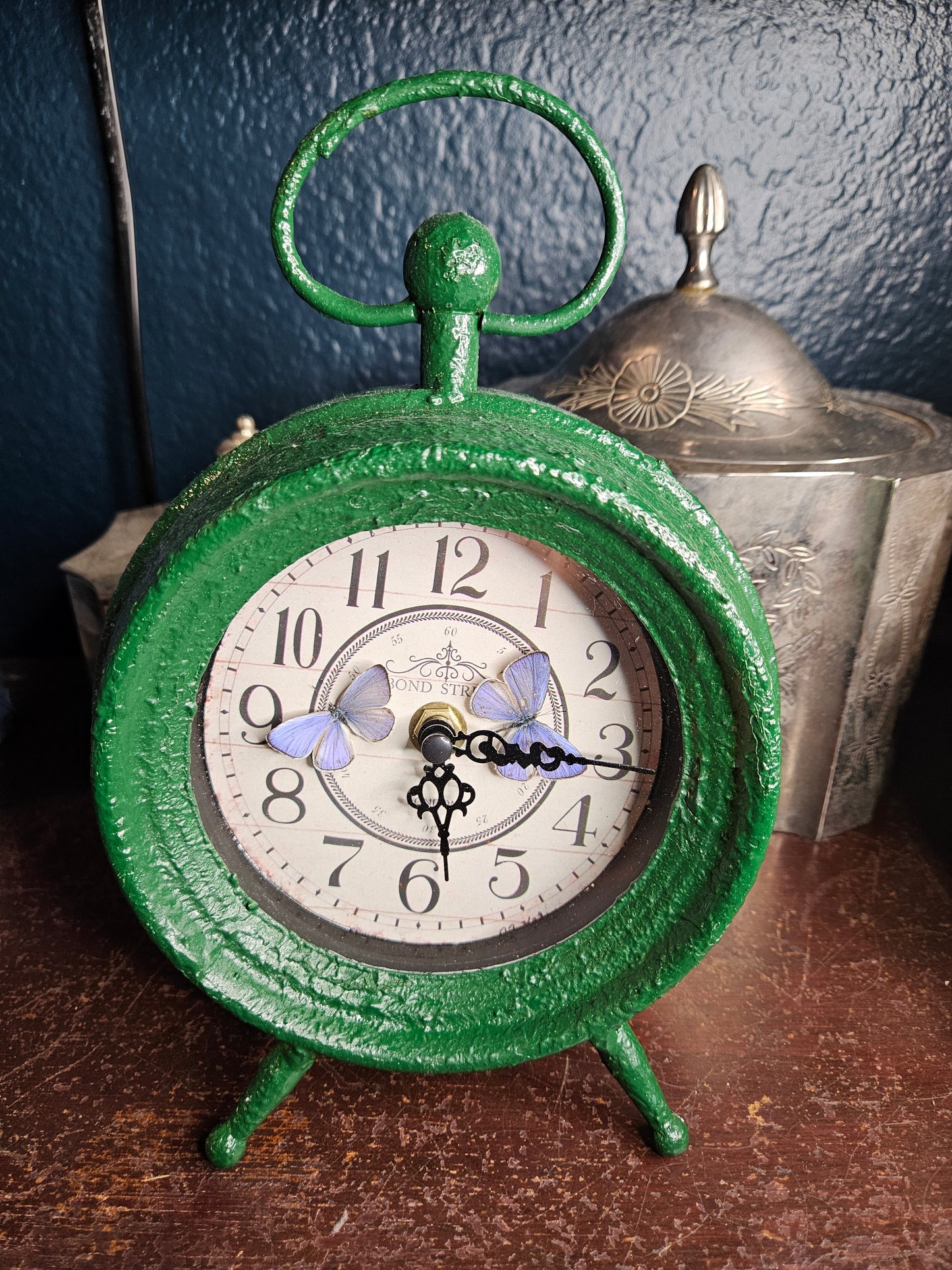Green clock double purple Holly blue butterflies