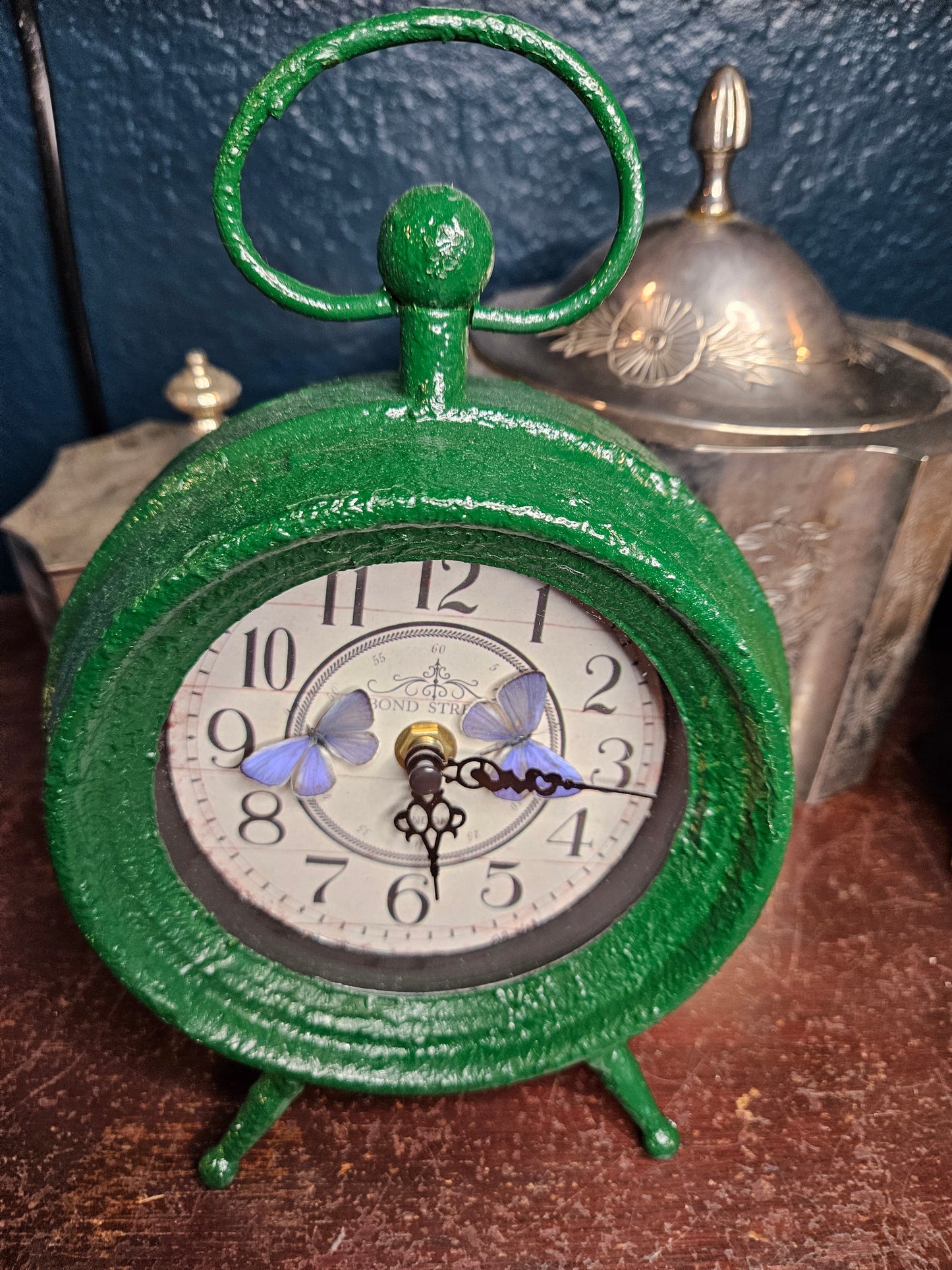 Green clock double purple Holly blue butterflies