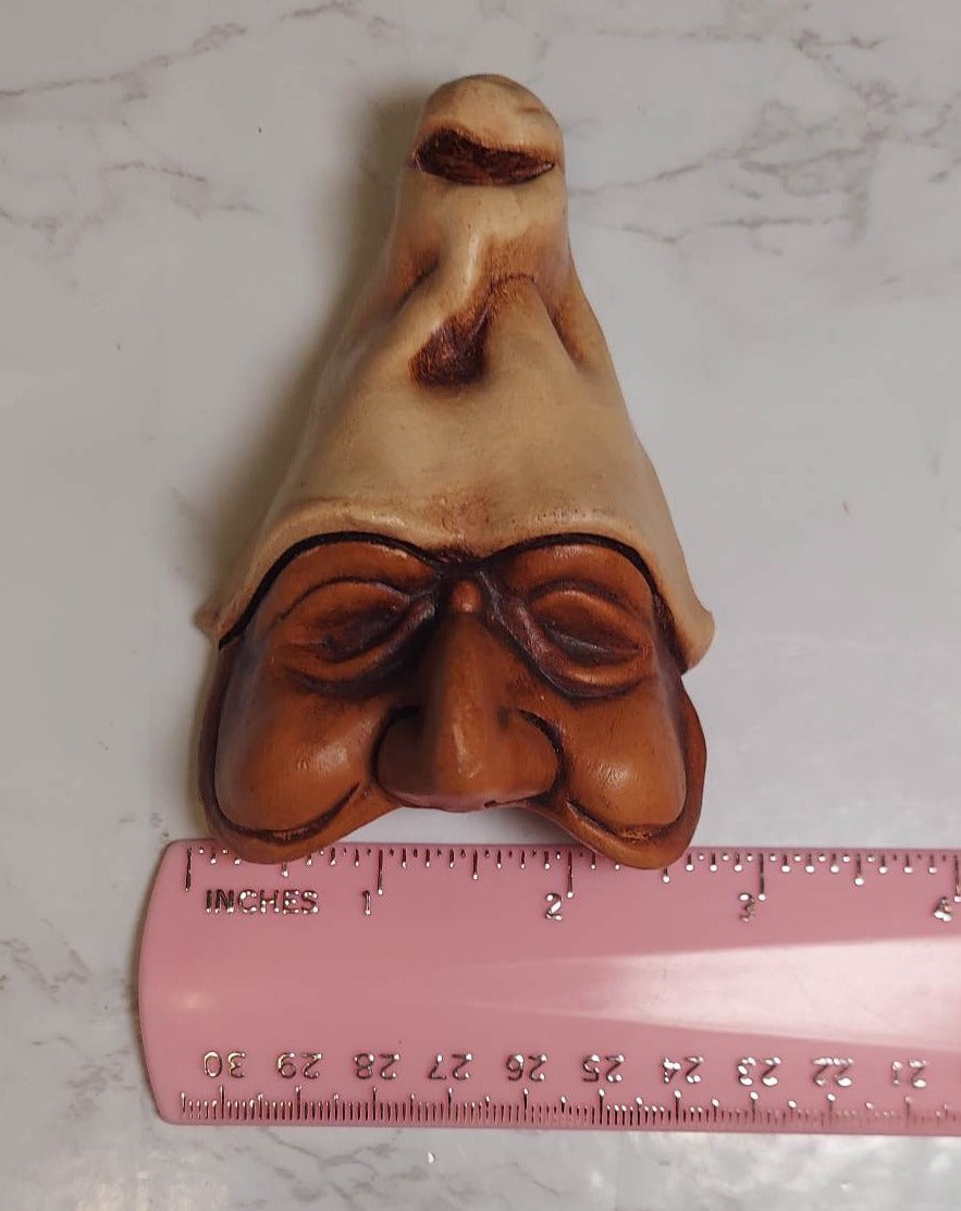 Vintage creepy yet cute sculpted man