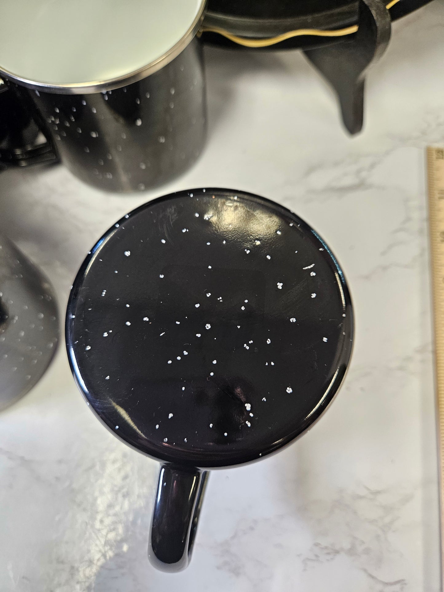 Set of 7 black enamel speckle camping mugs