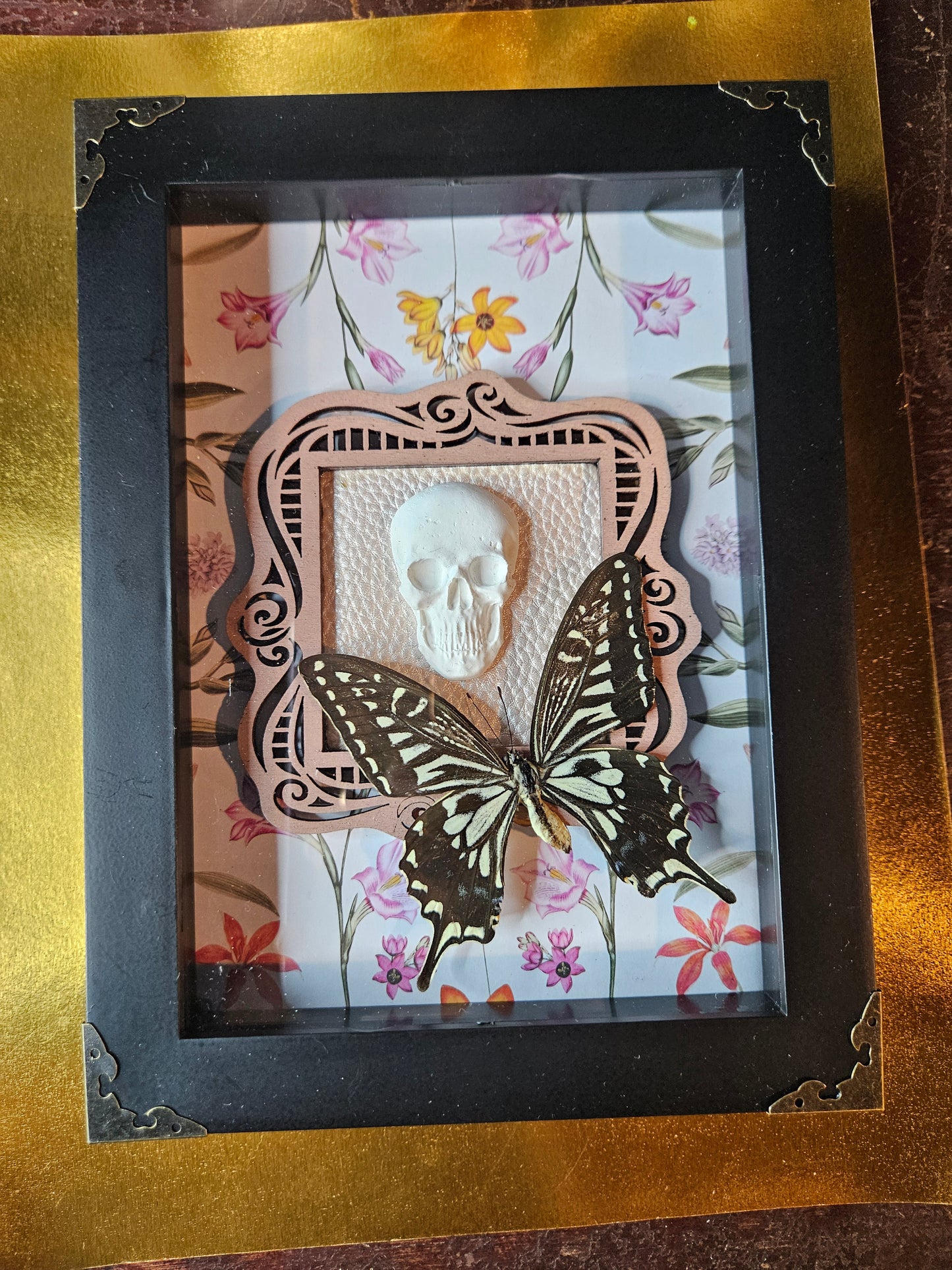 Pink floral skull butterfly frame