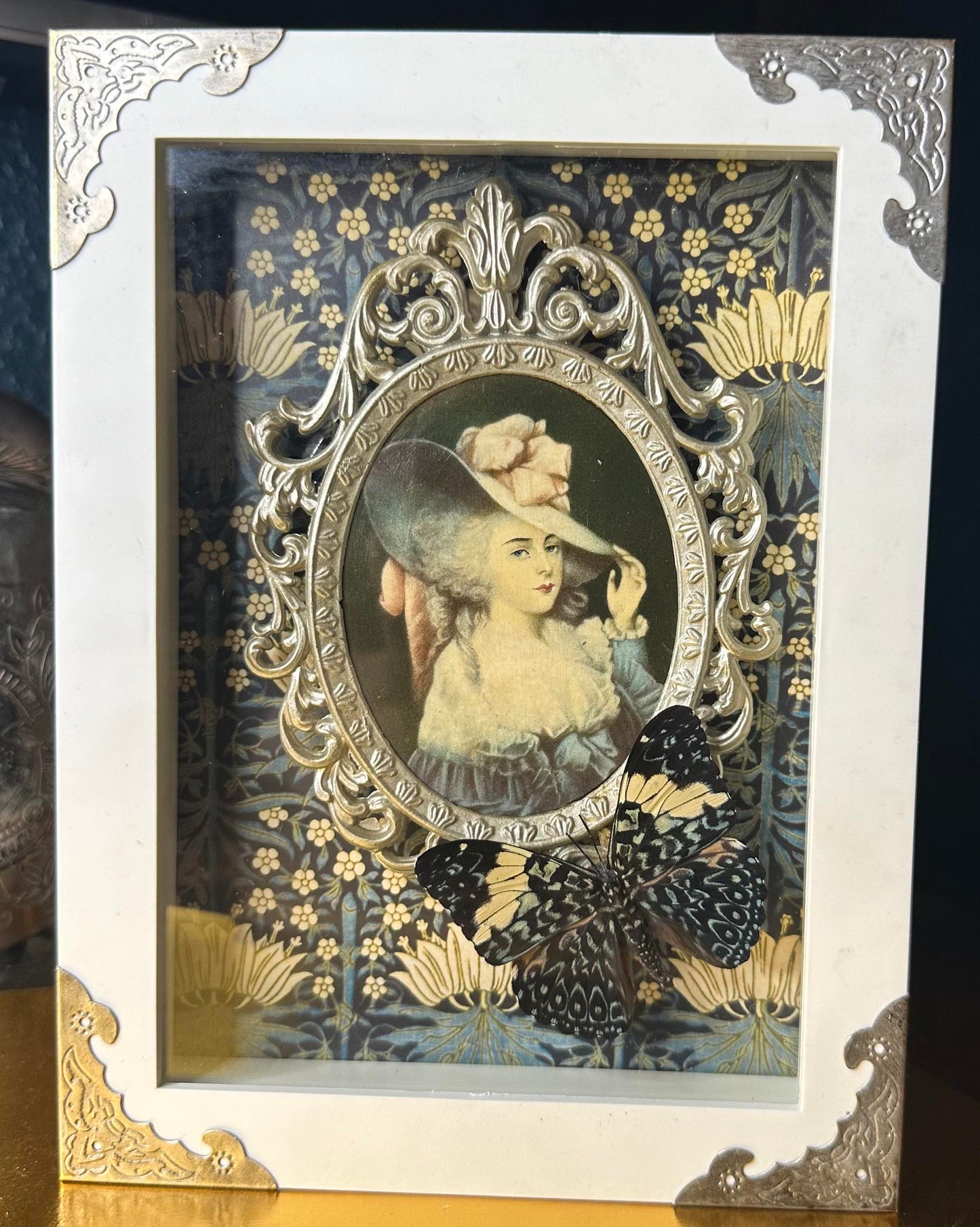 White framed ornate victorian lady blue butterfly