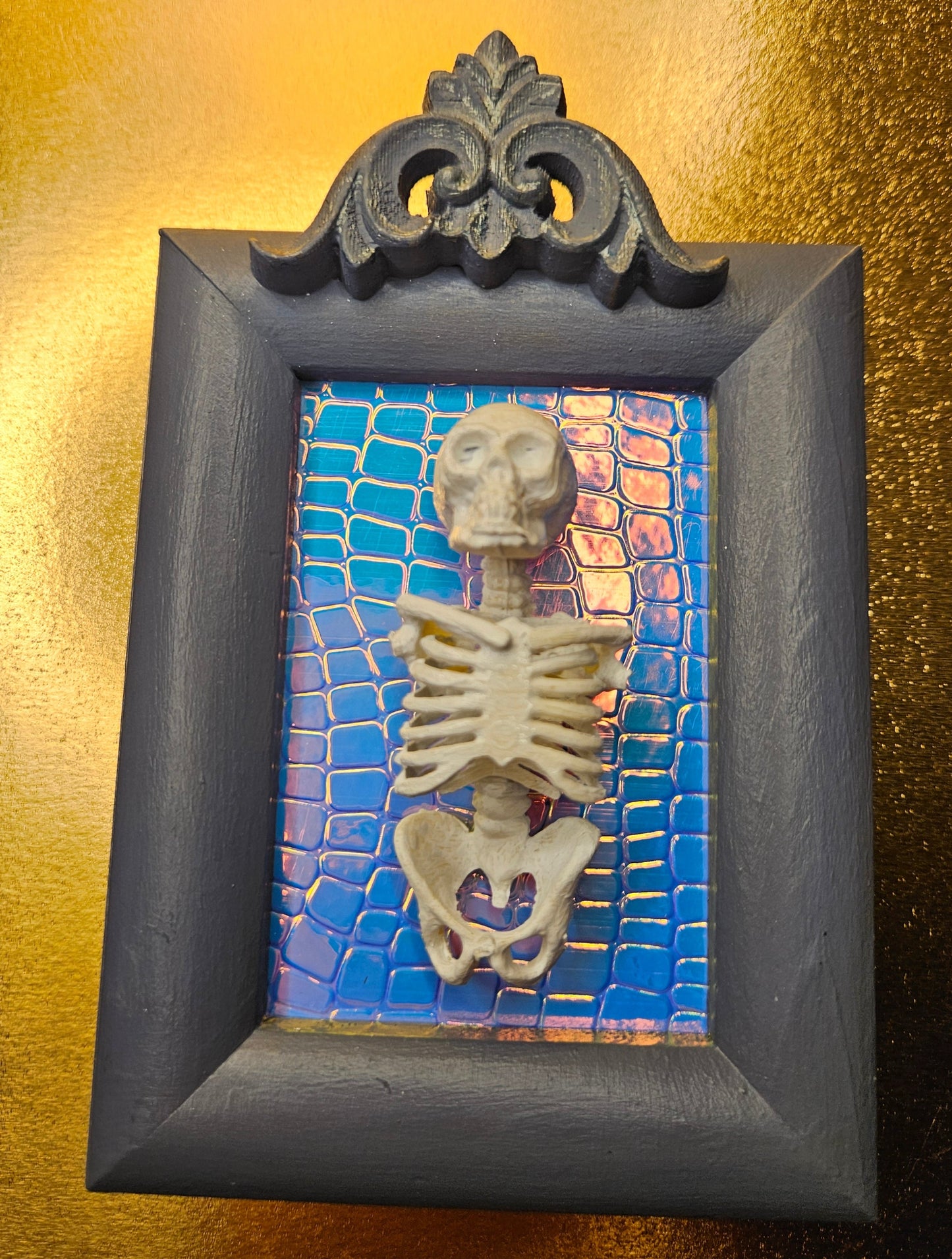 Blue framed mini torso