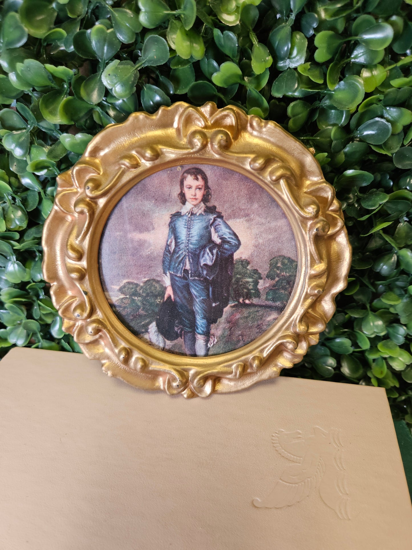 Vintage round ornate boy in blue small gold frame