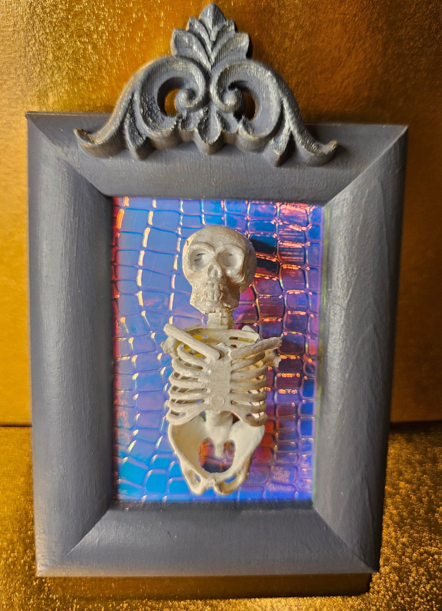 Blue framed mini torso