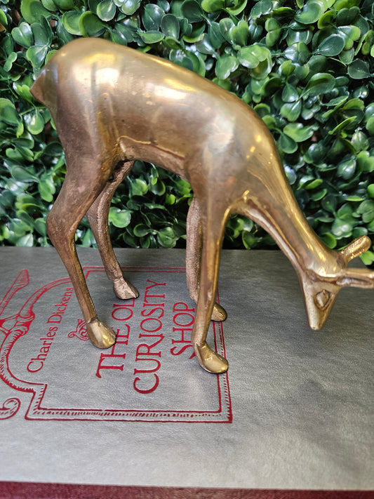 Vintage solid brass deer grazing figurine