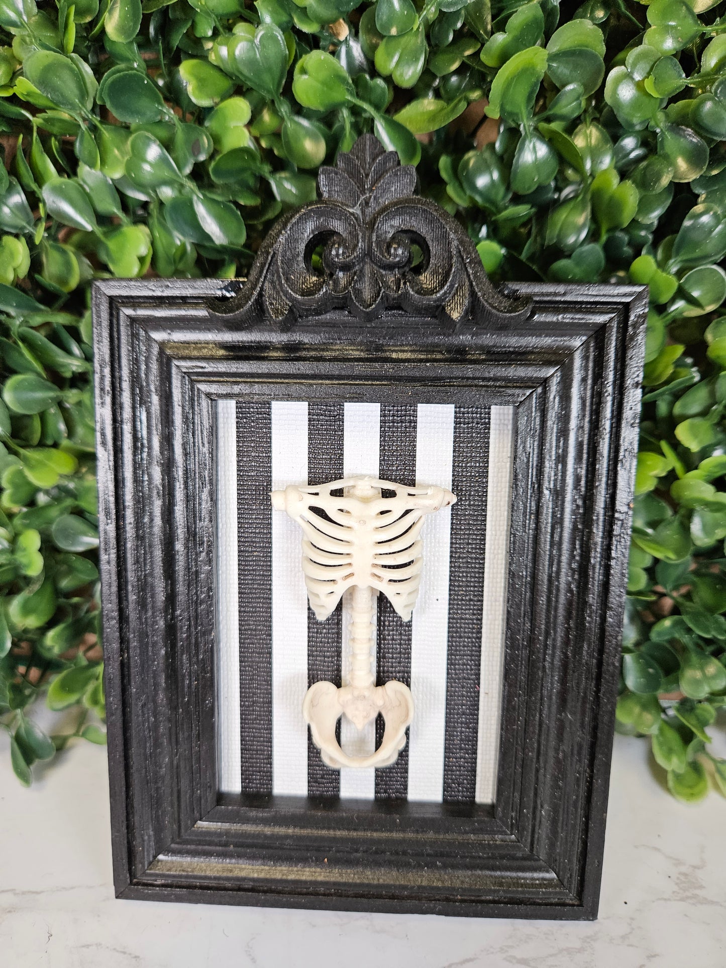 Black framed striped Torso A1