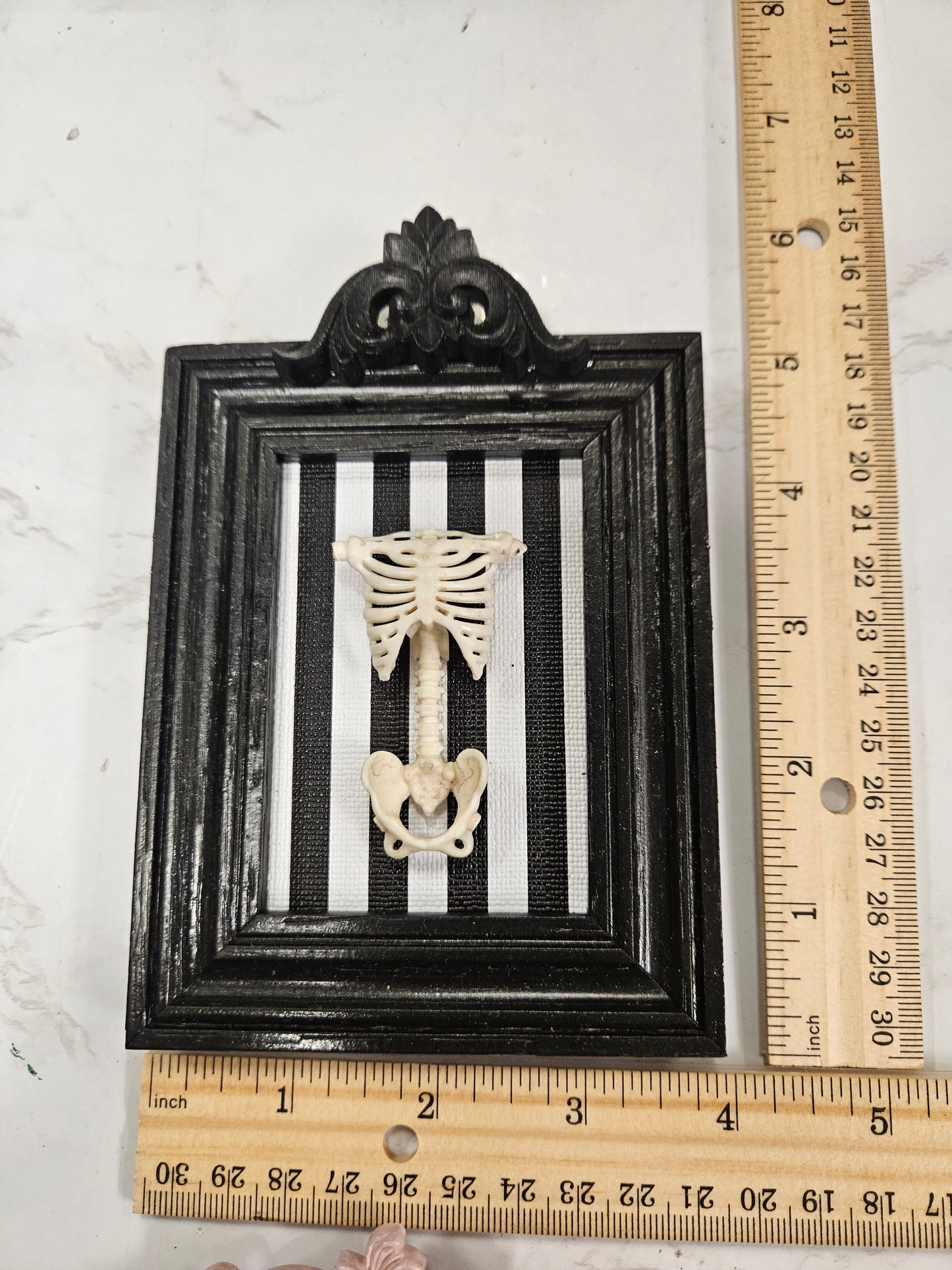 Black framed striped Torso A1