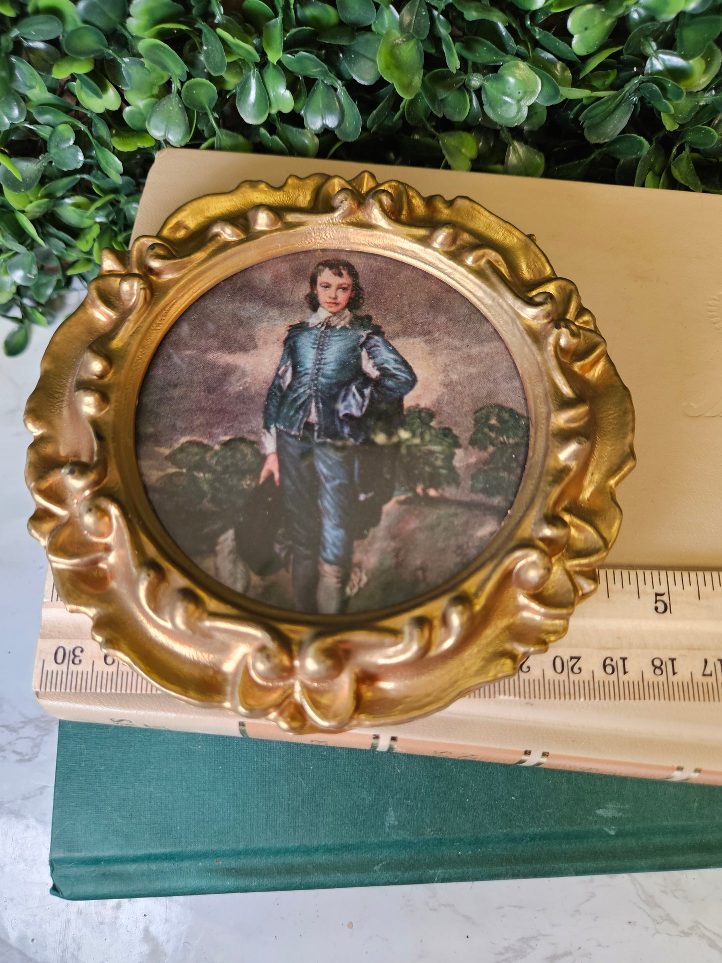 Vintage round ornate boy in blue small gold frame