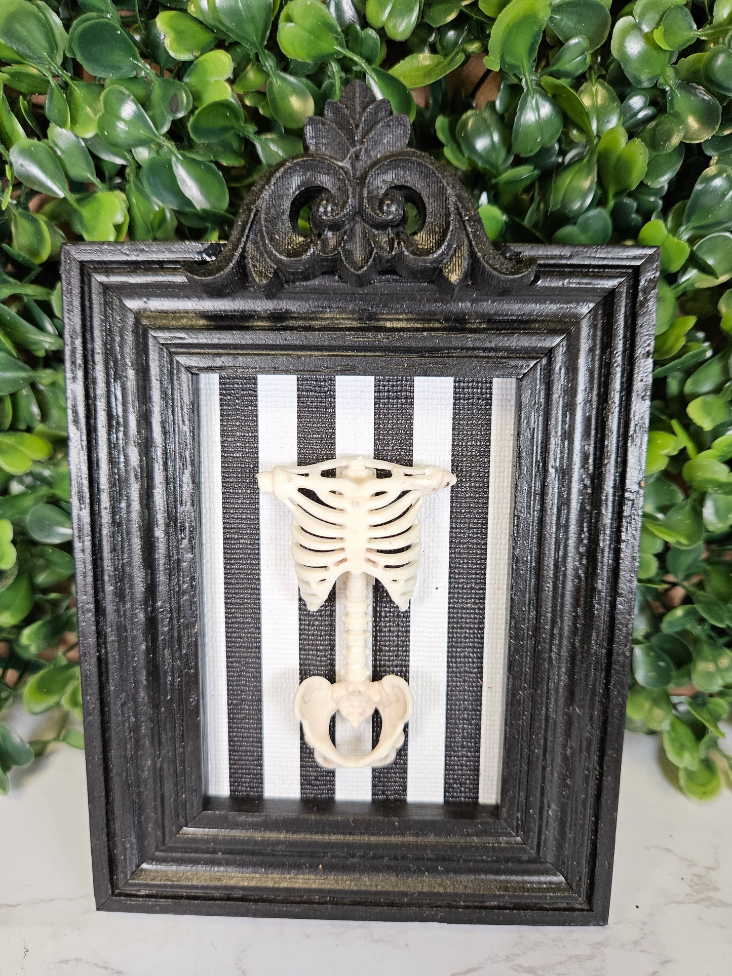 Black framed striped Torso A1