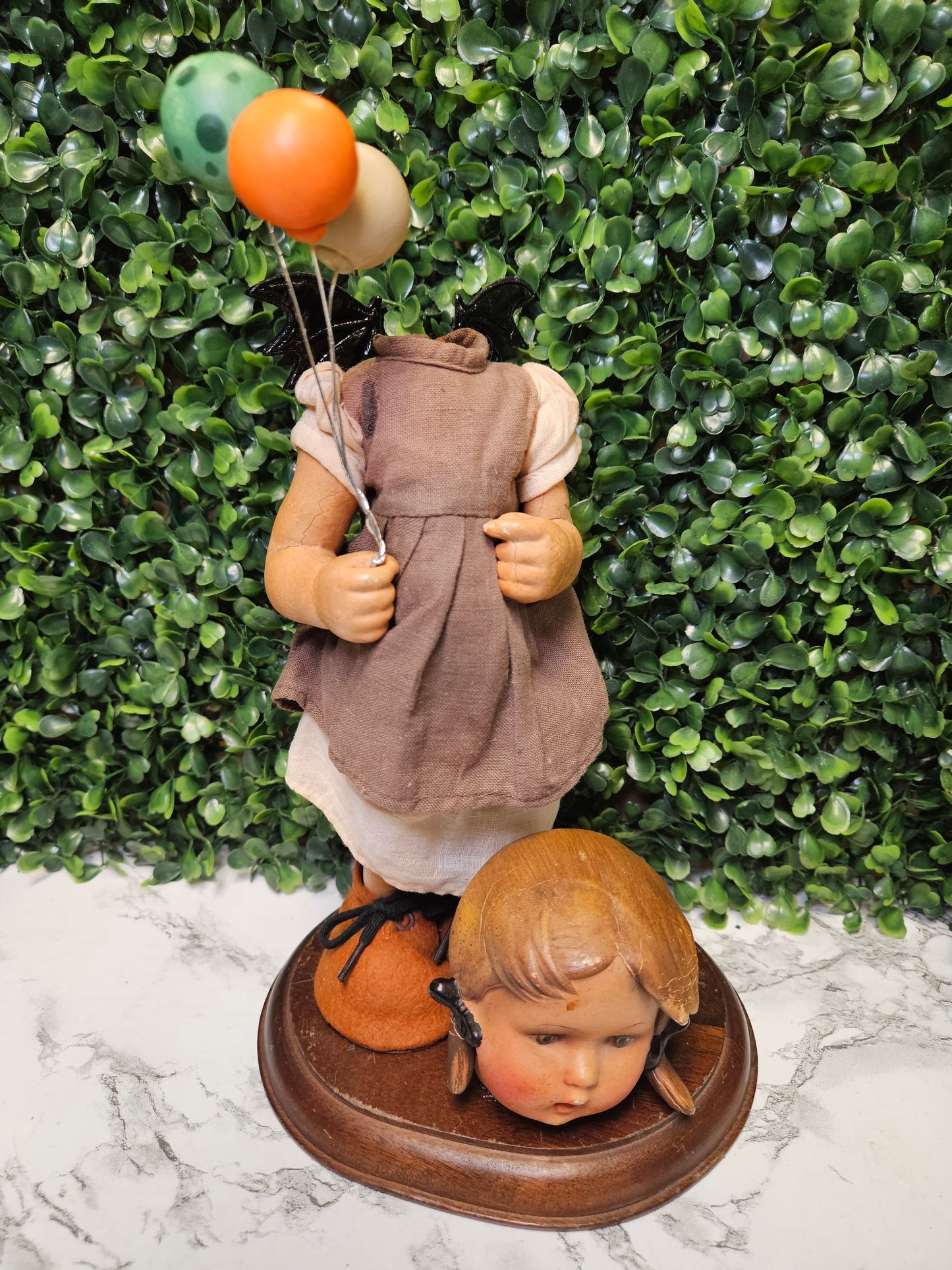 Vintage headless batty balloon doll