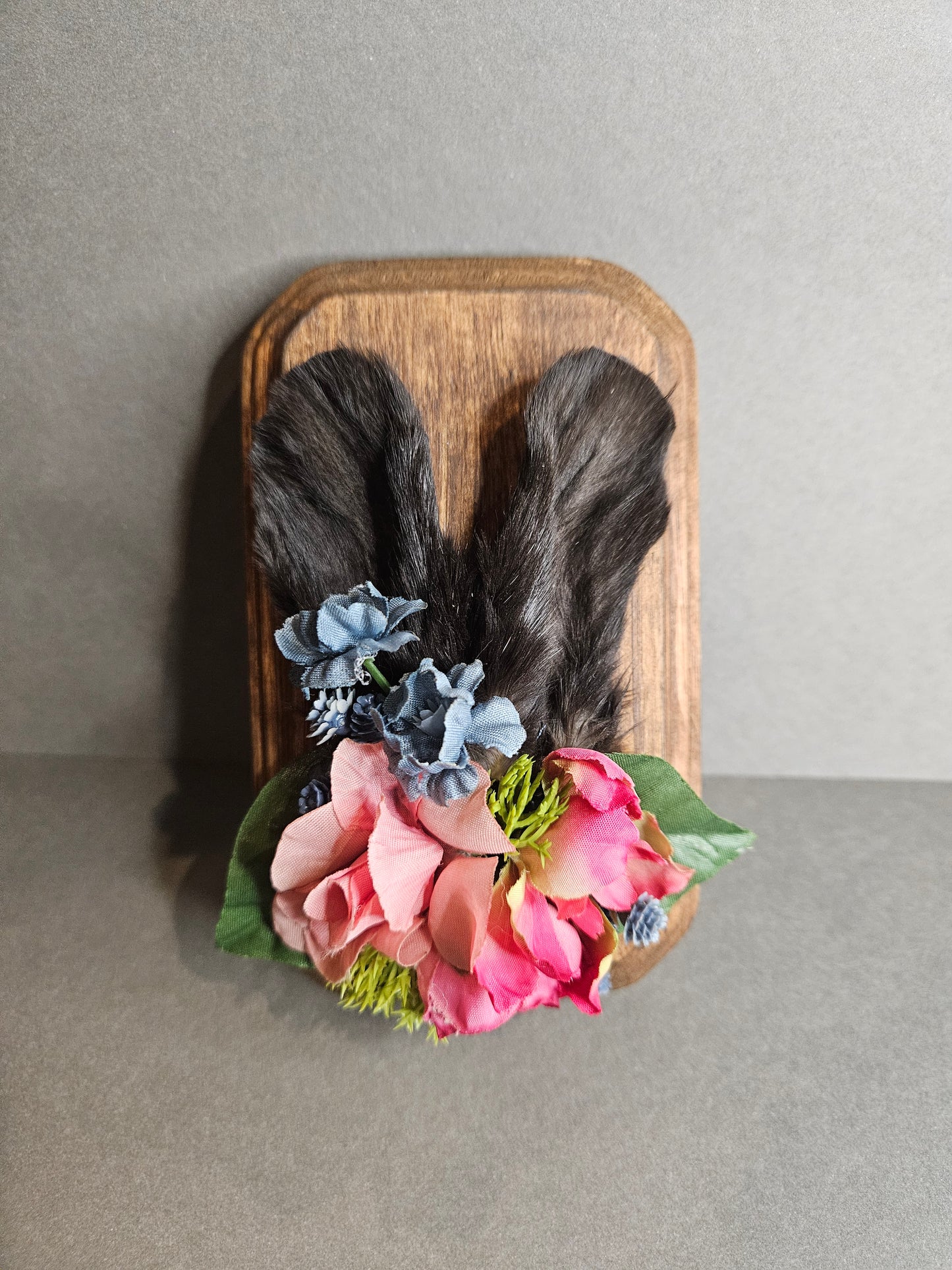 Rabbit ears pink floral wall plaque